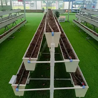 UV-resistant PVC hydroponic troughs outdoors
